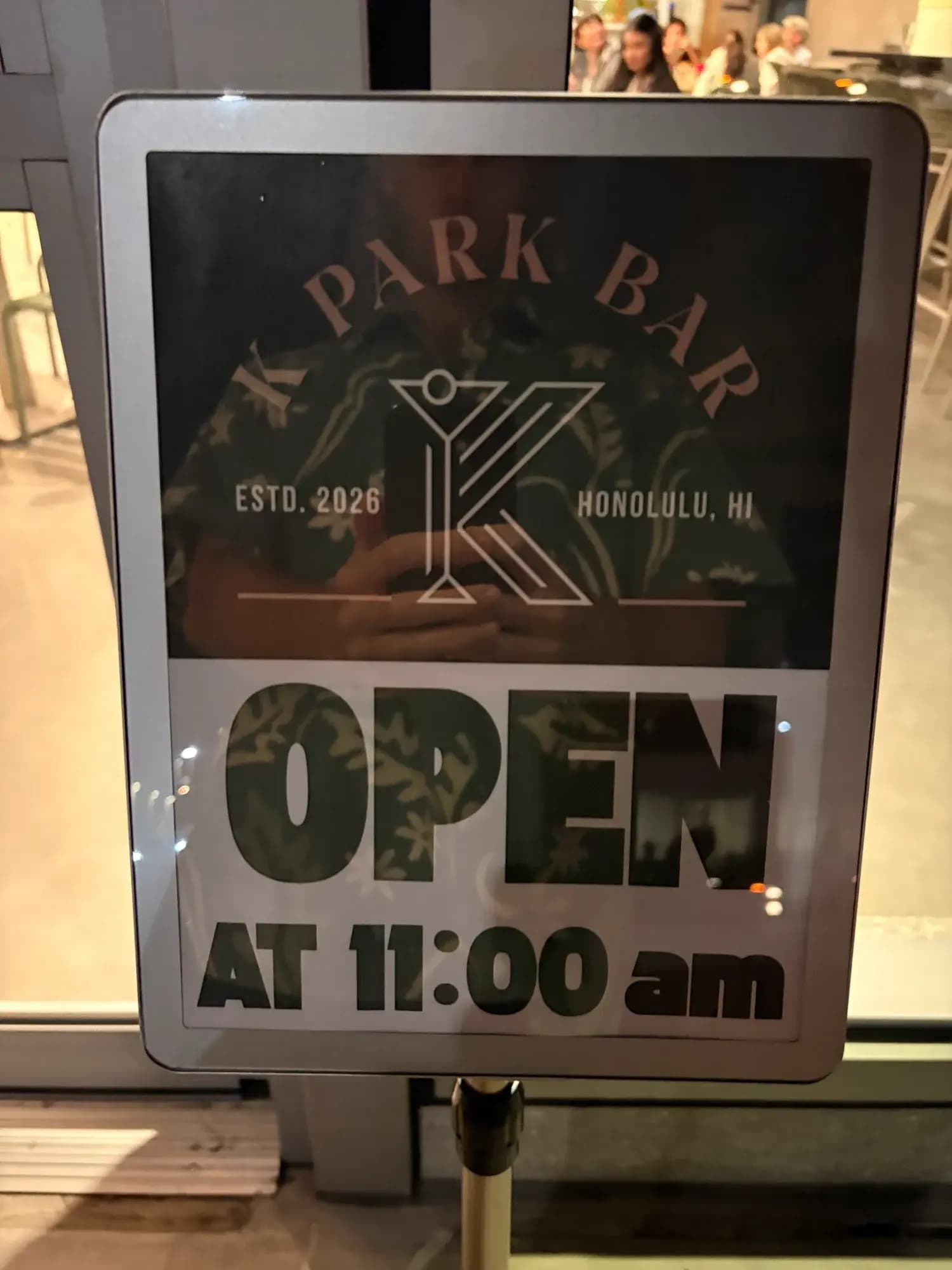 K Park Bar entrance sign showing Established 2026 Honolulu HI with opening hours